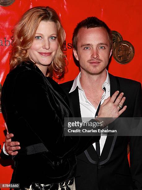 Actors Anna Gunn and Aaron Paul accept the AMC Peabody Award at the 68th Annual George Foster Peabody Awards at The Waldorf Astoria on May 18, 2009...