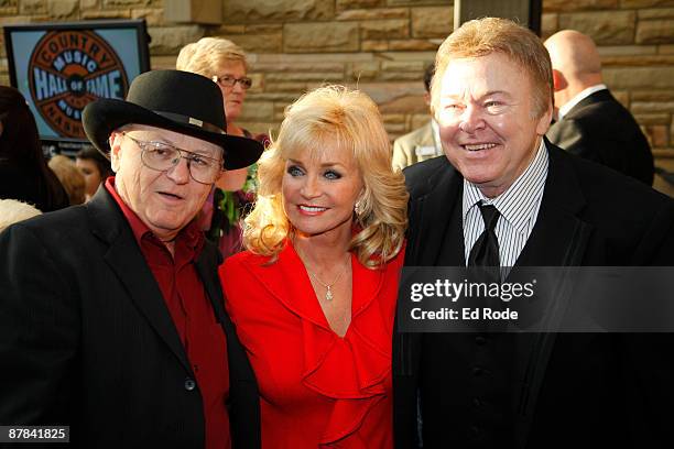 Charlie McCoy, Roy Clark and Barbara Mandrell attend the 2009 Country Music Hall of Fame Medallion Ceremony on May 17, 2009 in Nashville, Tennessee.