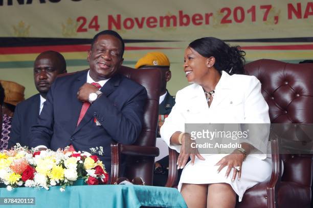 Emmerson Mnangagwa speaks with his wife Auxillia at the National Sports Stadium during his oath-taking ceremony following Robert Mugabes resignation...