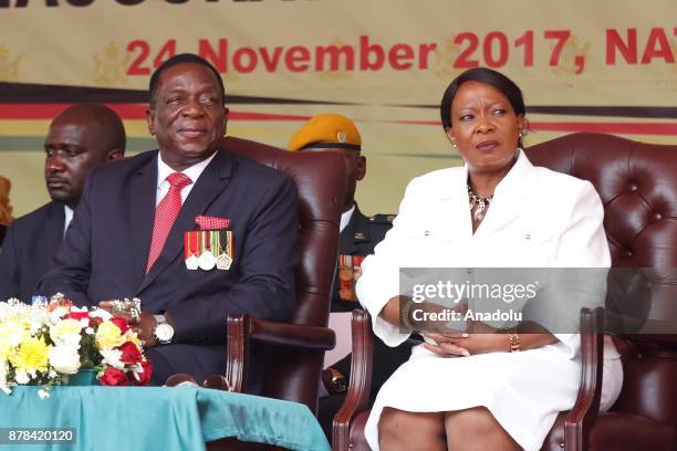 Emmerson Mnangagwa speaks with his wife Auxillia at the National Sports Stadium during his oath-taking ceremony following Robert Mugabes resignation...