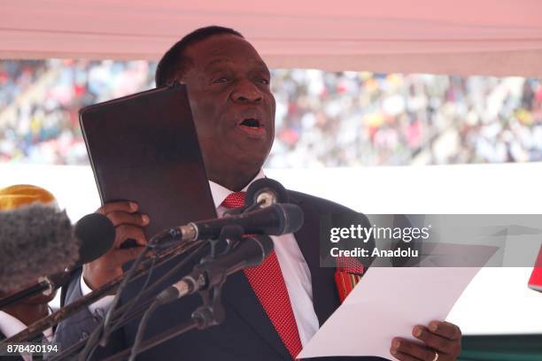 New Zimbabwe President Emerson Mnangagwa swears in during an oath-taking ceremony at the National Sports Stadium in Harare, Zimbabwe on November 24,...