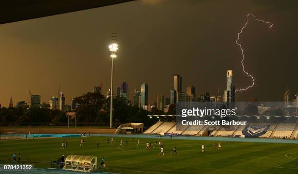 General view as lightning strikes near buildings in the city of Melbourne during the round eight W-League match between the Melbourne Victory and...