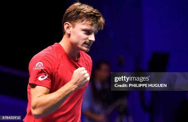 Belgium's David Goffin reacts after winning a point against France's Lucas Pouille during the Davis Cup World Group singles rubber final tennis match...