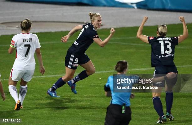 Natasha Dowie and Laura Spiranovic of the Victory celebrate after scoring their first goal of the match during the round eight W-League match between...