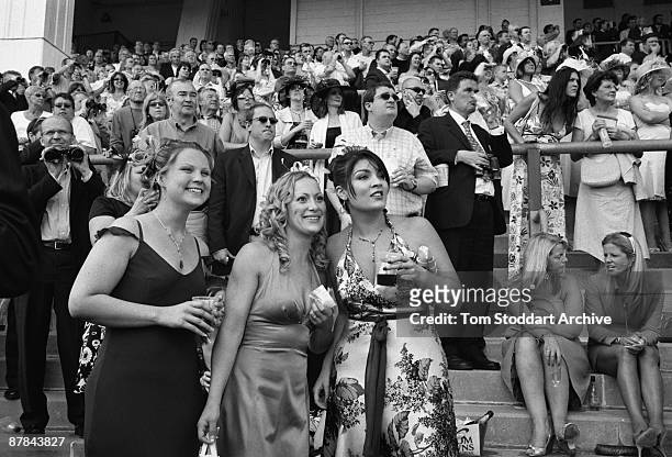 Winners and losers in the crowd during a race at Epsom, June 2007. Epson Downs Racecourse is where the iconic Derby Festival dating back to 1780 is...