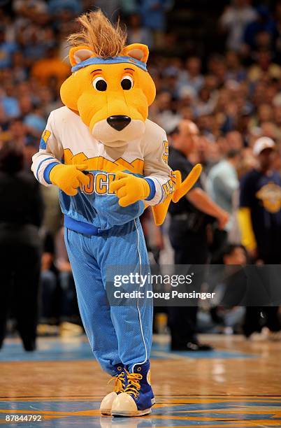 Rocky the mascot of the Denver Nuggets sports a wig emulating Chris Andersen's coife as the Nugget face the Dallas Mavericks in Game Five of the...