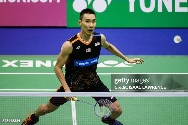 Maylasia's Lee Chong Wei hits a shot against Korea's Son Wan Ho during their quarterfinal men's singles match at the Hong Kong Open badminton...