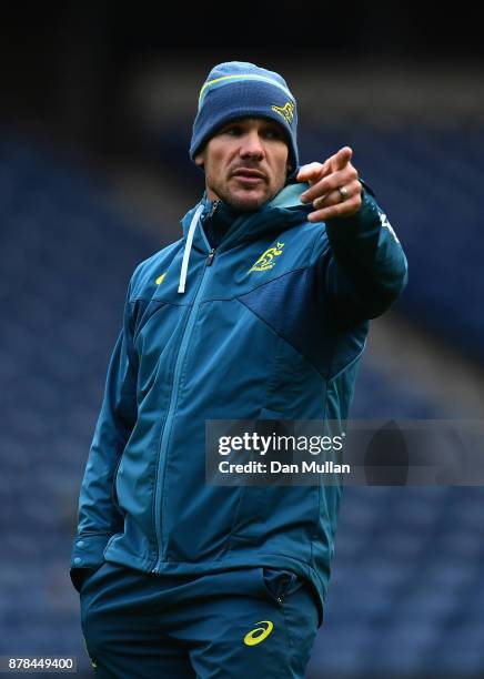 Nathan Grey, Defence Coach of Australia instructs his team during the Australia Captain's Run at Murrayfield Stadium on November 24, 2017 in...