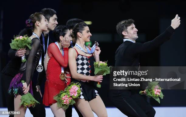 Second place winner Cheng Peng and Yang Jin of China, First place winner Sui Wenjing and Han Cong of China, Third place winner Valentina Marchei and...