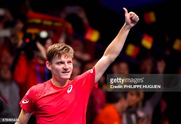 Belgium's David Goffin reacts after winning a match against France's Lucas Pouille during the Davis Cup World Group singles rubber final tennis match...