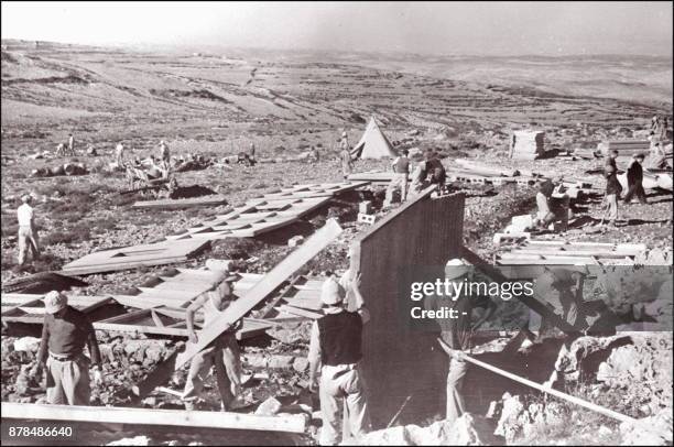 Jewish immigrants build prefabricated houses somewhere in Palestine, in 1948. On November 29 the United Nations' General Assembly voted resolution...