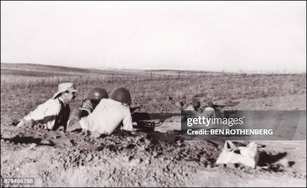 Member of Tsahal, Israeli army created 31 May 1948, fire the heavy machine-guns at Egyptian soldiers of allied Arab forces 18 November 1948 near Iraq...