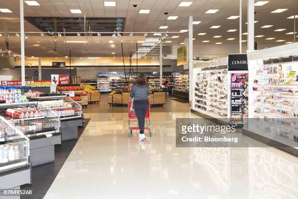 Shopper walks towards the grocery section of a Target Corp. Store on Black Friday in Dallas, Texas, on Friday, Nov. 24, 2017. The National Retail...