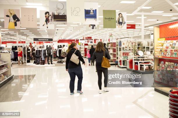 Shoppers enter a Target Corp. Store on Black Friday in Dallas, Texas, on Friday, Nov. 24, 2017. The National Retail Federation projects that...