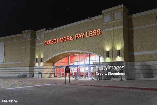 Shoppers stand in line to enter a Target Corp. Store on Black Friday in Dallas, Texas, on Friday, Nov. 24, 2017. The National Retail Federation...
