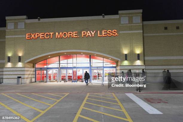 Shoppers stand in line to enter a Target Corp. Store on Black Friday in Dallas, Texas, on Friday, Nov. 24, 2017. The National Retail Federation...