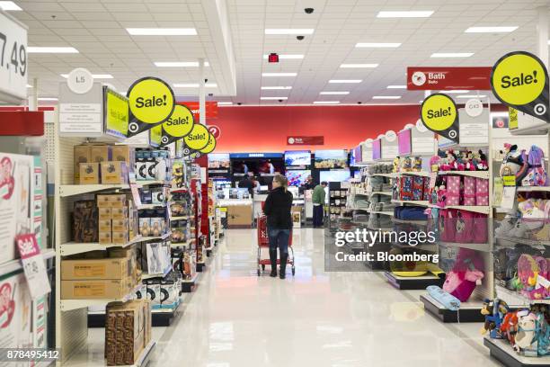 Signs that read "Sale!" are displayed on aisles inside a Target Corp. Store on Black Friday in Dallas, Texas, on Friday, Nov. 24, 2017. The National...