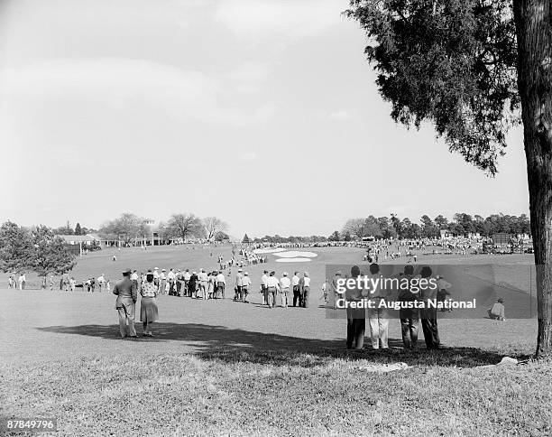 Patrons watch the action on the seventh hole during the 1947 Masters Tournament at Augusta National Golf Club in April 1947 in Augusta, Georgia.