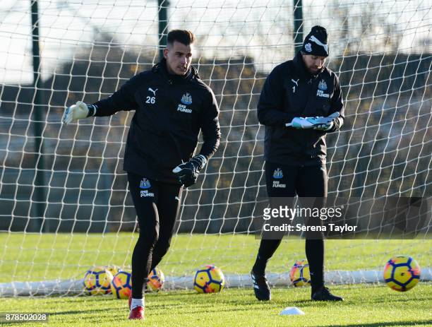 Goalkeepers Karl Darlow and Rob Elliot warm up during the Newcastle United Training Session at the Newcastle United Training Centre on November 24 in...