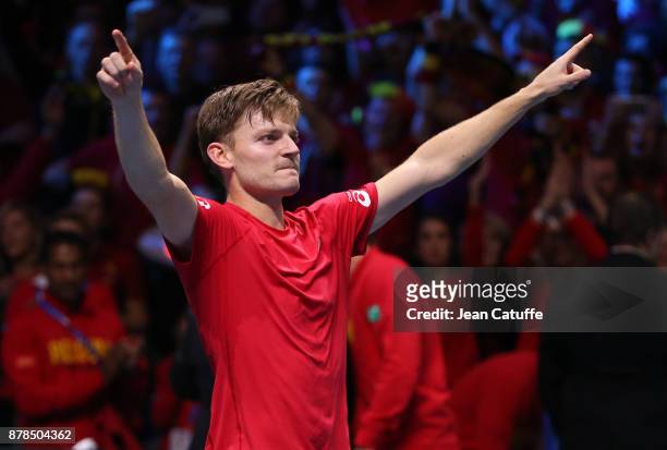 David Goffin of Belgium celebrates winning his first match against Lucas Pouille of France during day 1 of the Davis Cup World Group Final between...