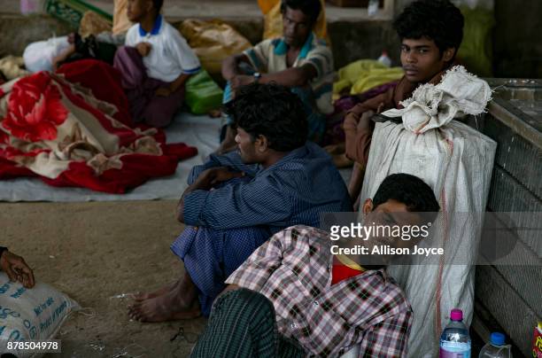 Recently arrived Rohingya refugees rest after crossing into Bangladesh, on November 24, 2017 in Cox's Bazar, Bangladesh. Myanmar and Bangladesh...