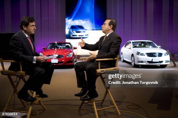 Carlos Ghosn, CEO of Nissan and Renault is intreviewed by TV media at the Los Angeles auto show November 14, 2007 in Los Angeles, California.