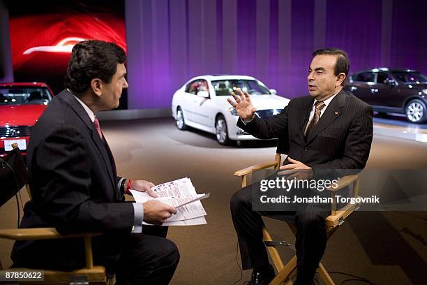 Carlos Ghosn, CEO of Nissan and Renault is intreviewed by TV media at the Los Angeles auto show November 14, 2007 in Los Angeles, California.