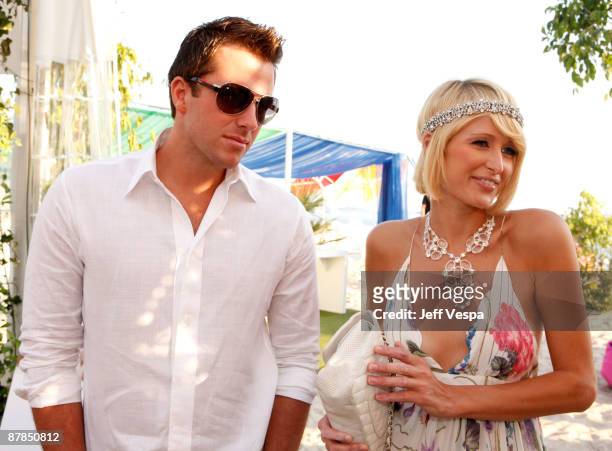 Paris Hilton and Doug Reinhardt attend the Paris Not France Cocktail Party at la plage vitaminwater during the 62nd Annual Cannes Film Festival on...