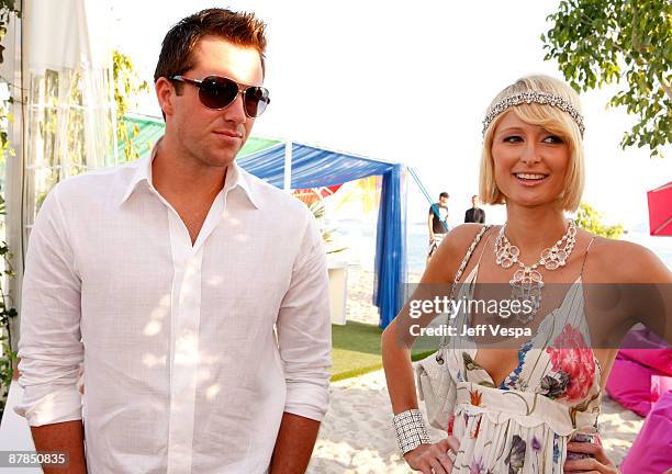 Paris Hilton and Doug Reinhardt attend the Paris Not France Cocktail Party at la plage vitaminwater during the 62nd Annual Cannes Film Festival on...