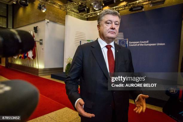 Ukrainian President Petro Poroshenko addresses the media at the end of the EU Eastern Partnership Summit in Brussels on November 24 2017. The EU...