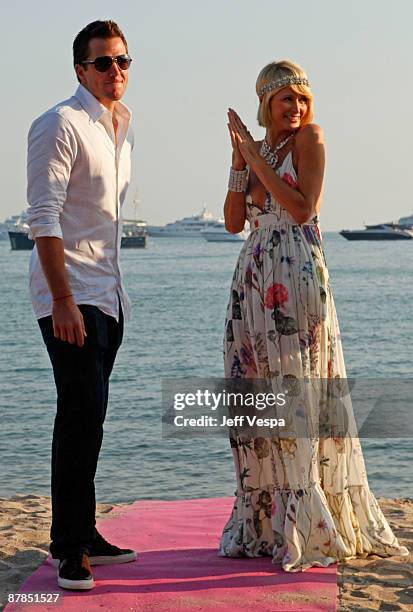 Doug Reinhardt and Paris Hilton attend the Paris Not France Cocktail Party at la plage vitaminwater during the 62nd Annual Cannes Film Festival on...