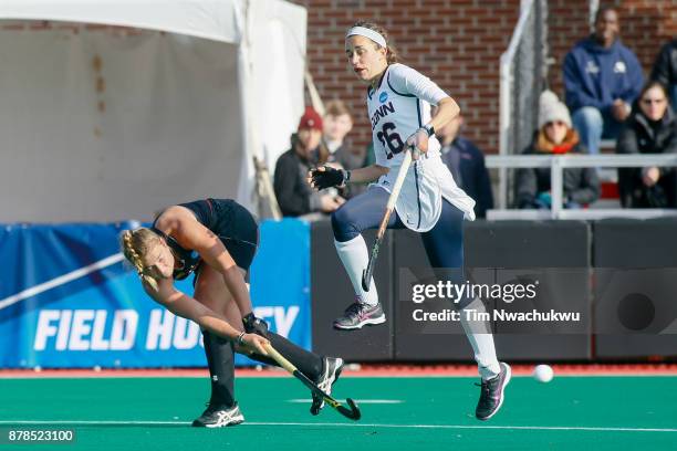 Bodil Keus of the University of Maryland attempts a pass past Charlotte Veitner of the University of Connecticut during the Division I Women's Field...