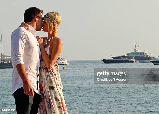 Doug Reinhardt and Paris Hilton attend the "Paris Not France" Cocktail Party at la plage vitaminwater during the 62nd Annual Cannes Film Festival on...