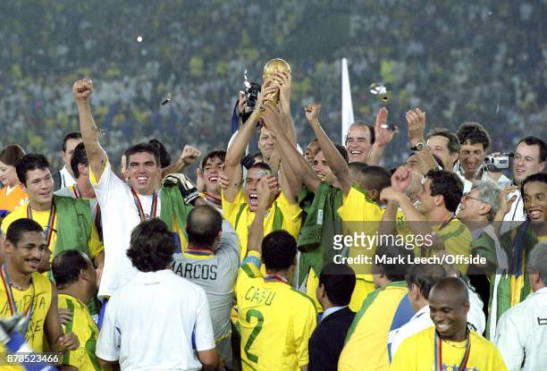 June 2002 Yokohama : FIFA World Cup Final - Brazil v Germany : Ronaldo holds the trophy aloft for Brazil