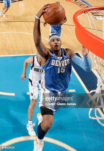 Carmelo Anthony of the Denver Nuggets goes to the basket against the Dallas Mavericks in Game Four of the Western Conference Semifinals during the...