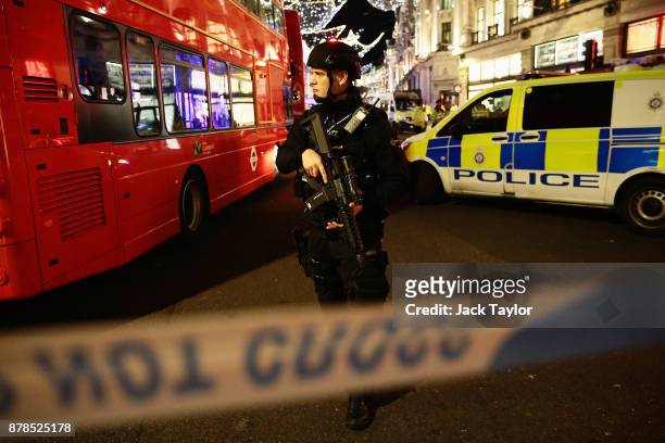 Armed Police officers are seen near Oxford Circus underground station on November 24, 2017 in London, England. Police are responding to reports of an...