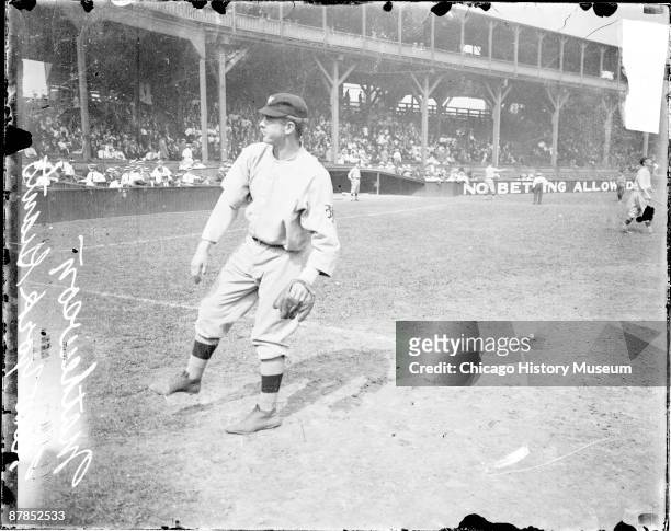 Informal full-length portrait of baseball player Christopher 'Christy' Mathewson of the National League's New York Giants, following through after...