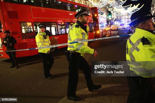 Police officers are seen near Oxford Circus underground station on November 24, 2017 in London, England. Police are responding to reports of an...