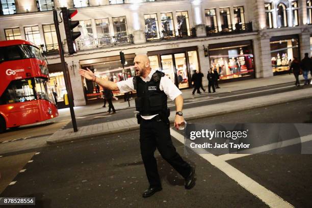 Police officers are seen near Oxford Circus underground station on November 24, 2017 in London, England. Police are responding to reports of an...