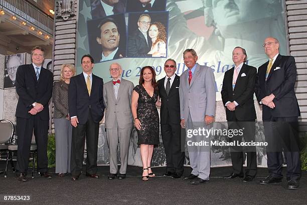 Assistant Secretary of the Interior for Fish and Wildlife and Parks, Thomas Strickland and event host, actress Candice Bergen pose with honorees...