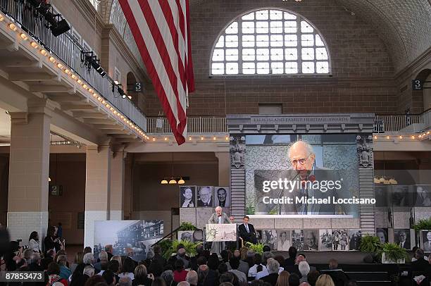 Dr. Eric R. Kandel addresses the audience after being honored during the 8th Annual Ellis Island Family Heritage Awards on Ellis Island on May 19,...