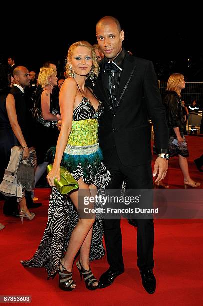 Personality Tatiana Laurens and husband Xavier Delarue attend the Vincere Premiere held at the Palais des Festivals during the 62nd International...