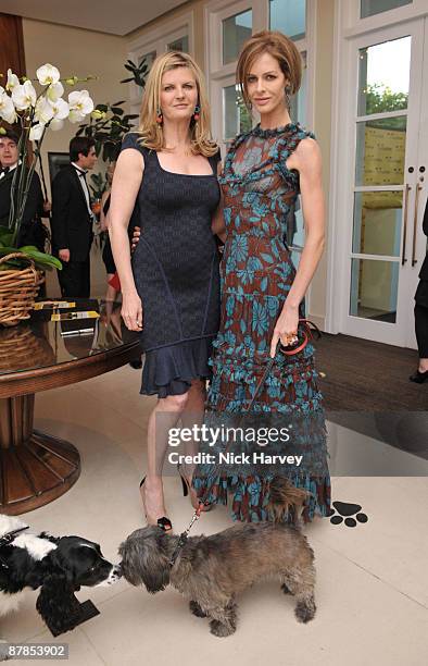 Susannah Constantine and Trinny Woodall with Poppy the dog attend the Dogs Trust Honours 2009 at The Hurlingham Club on May 19, 2009 in London,...