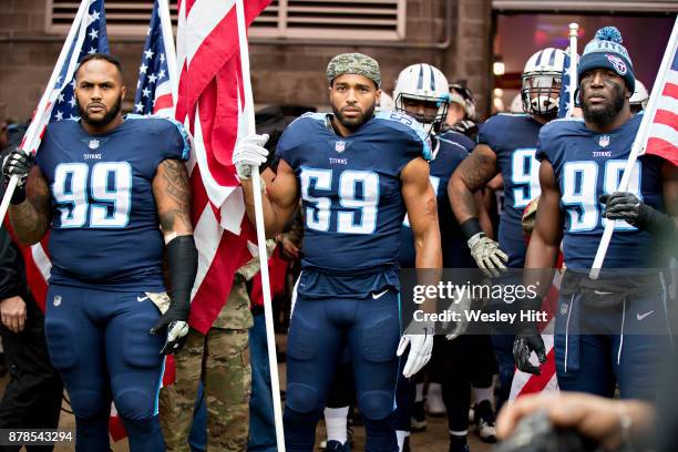 Brian Orakpo, Wesley Woodyard and Jurrell Casey of the Tennessee Titans during introductions before a game against the Cincinnati Bengals at Nissan...