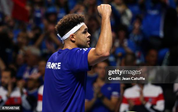 Jo-Wilfried Tsonga of France celebrates his victory against Steve Darcis of Belgium during day 1 of the Davis Cup World Group Final between France...