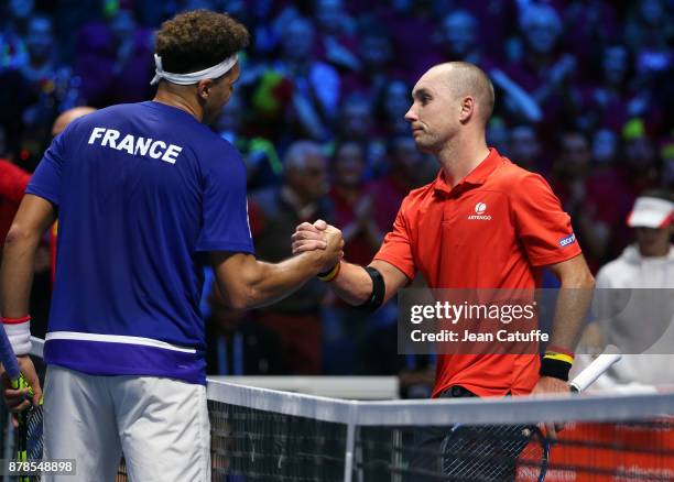 Jo-Wilfried Tsonga of France greets Steve Darcis of Belgium at the net after beating him in 3 sets during day 1 of the Davis Cup World Group Final...