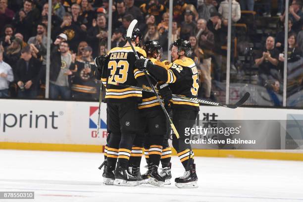 The Boston Bruins celebrate a goal in the first period against the Pittsburgh Penguins at the TD Garden on November 24, 2017 in Boston, Massachusetts.