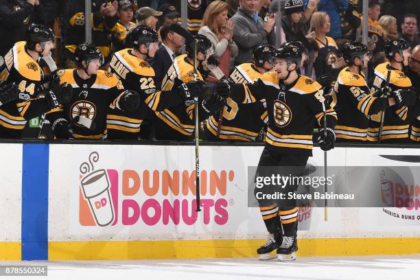 Sean Kurlay of the Boston Bruins celebrates his goal in the first period against the Pittsburgh Penguins at the TD Garden on November 24, 2017 in...