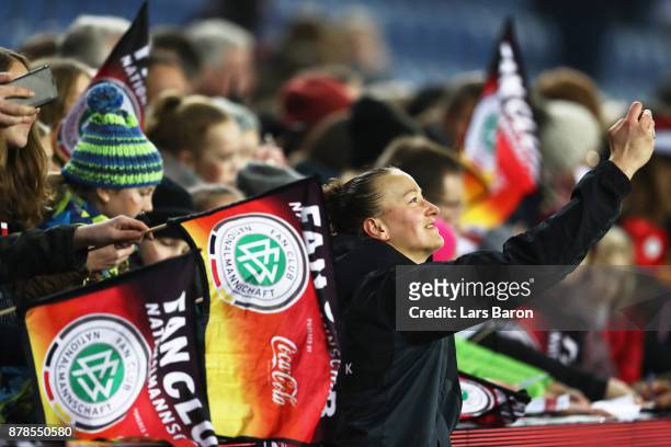 Almuth Schult of Germany celebrates with the fans after the Germany v France Women's International Friendly match at Schueco Arena on November 24,...