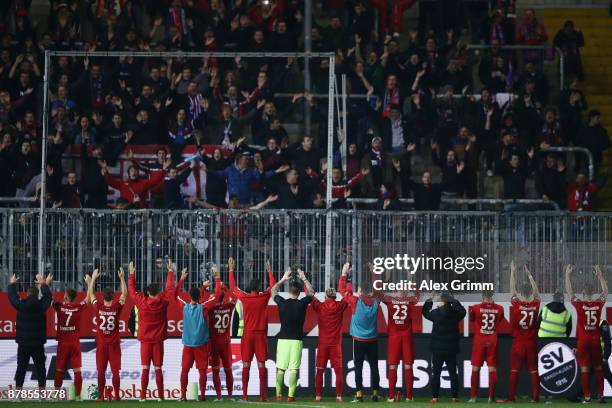 Players of Heidenheim celebrate with the fans after the Second Bundesliga match between SV Sandhausen and 1. FC Heidenheim 1846 at BWT-Stadion am...